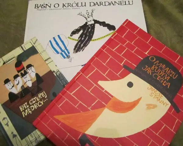 Okładki trzech książek z ilustracjami Janusza Stannego: "Baśń o królu Dardanelu", "Raz czterej mędrcy..." i "O malarzu rudym jak cegła".